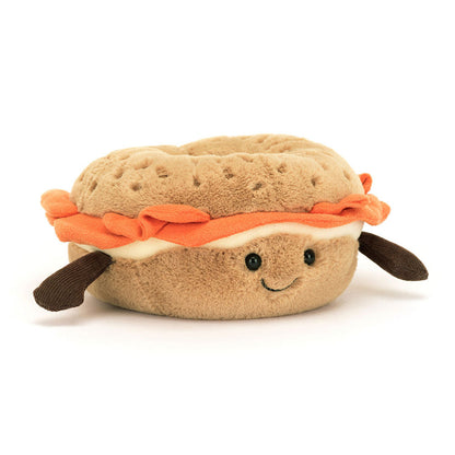 Jellycat Amuseables Bagel plush toy with soft, colorful fabric and embroidered facial features, perfect for cuddling and play.