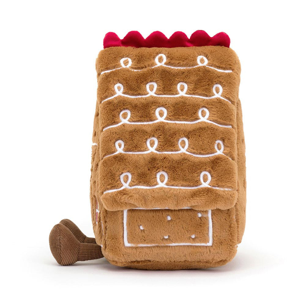 Jellycat Amuseable Gingerbread House plush toy with smiling face, candy details, and cozy winter design.